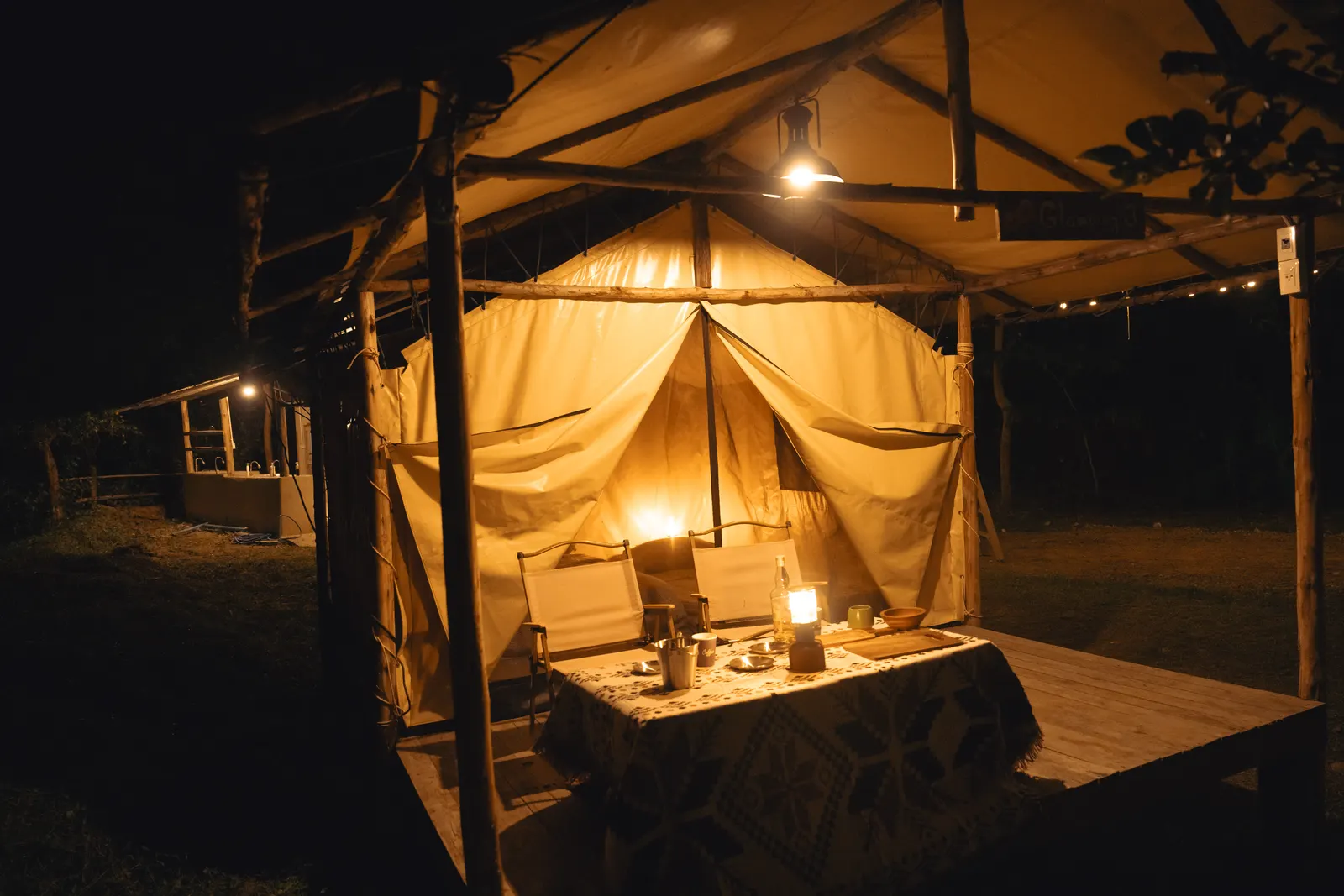 A safari tent at night