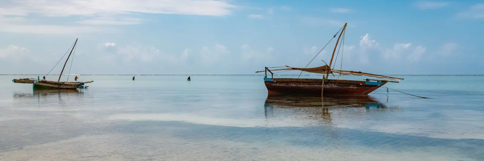 A dhow on the Indian Ocean at low tide