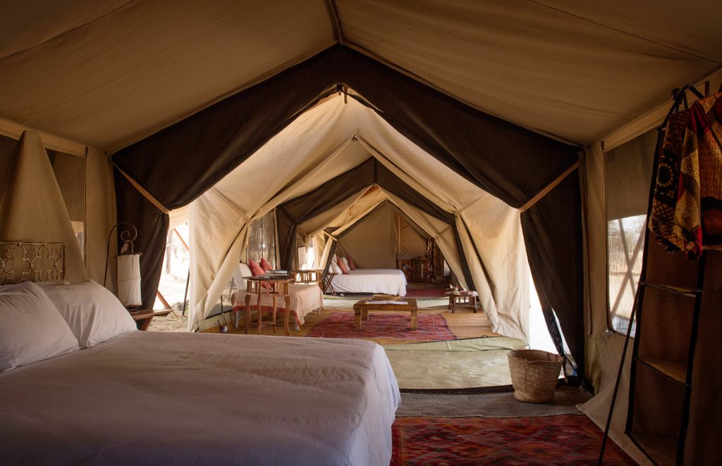 Serian's Serengeti South: Guest tent interior looking through to the bed and bathroom