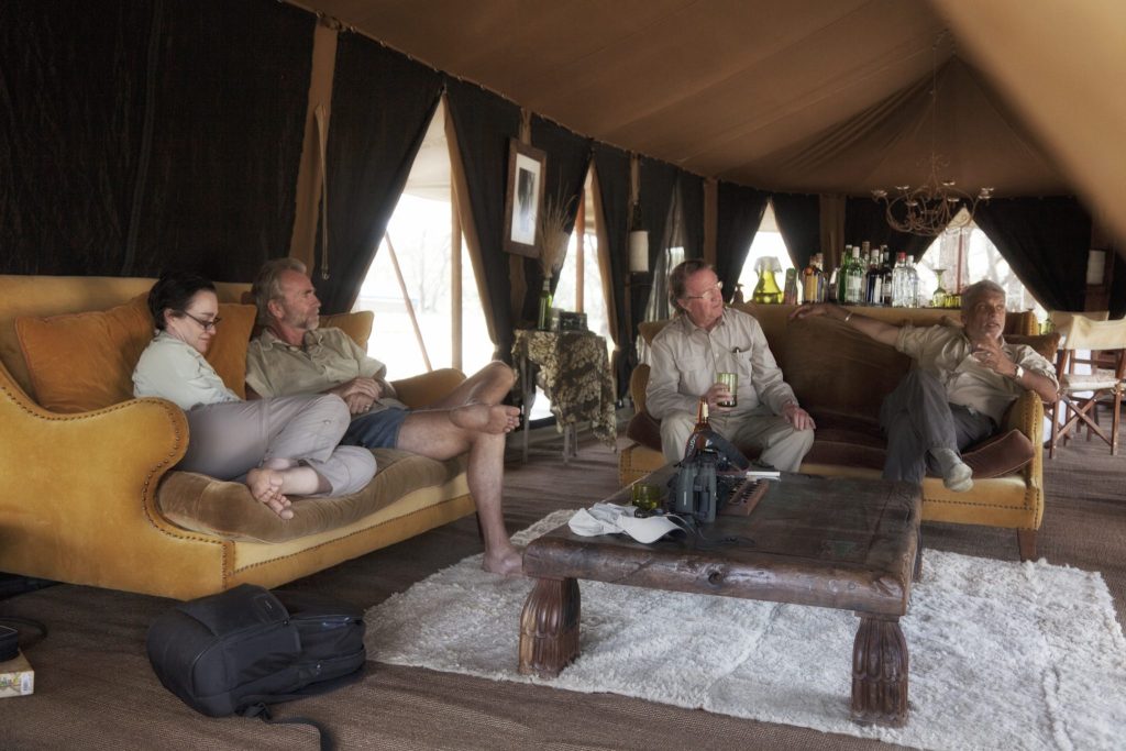 Serian's Serengeti South: Guests relaxing on sofas in the lounge tent